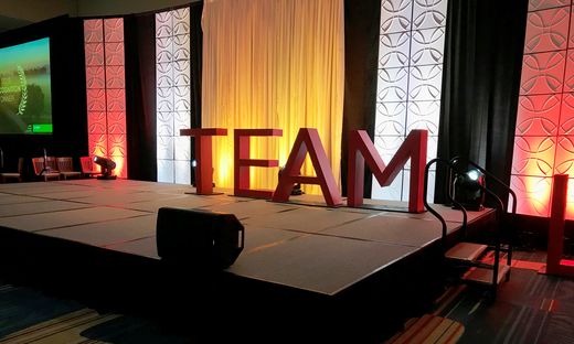 How Oversized Stage Letters Transform Corporate Events Into Immersive Brand Experiences